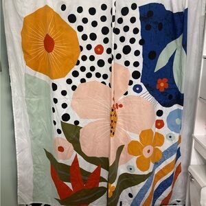 Floral Shower curtain with 10 shower curtain hooks.